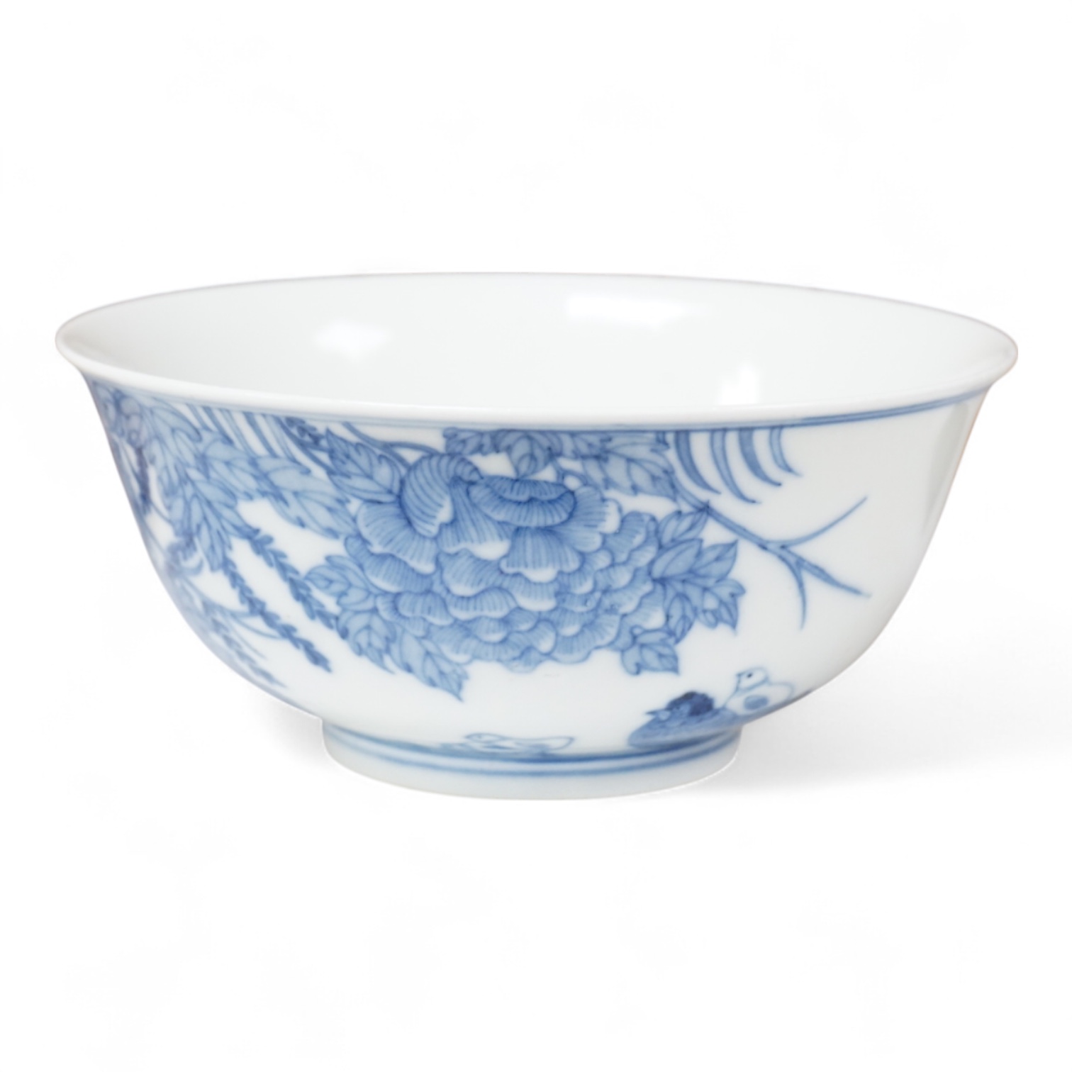 A Chinese blue and white bowl, decorated with flowers and birds, 14.5cm in diameter